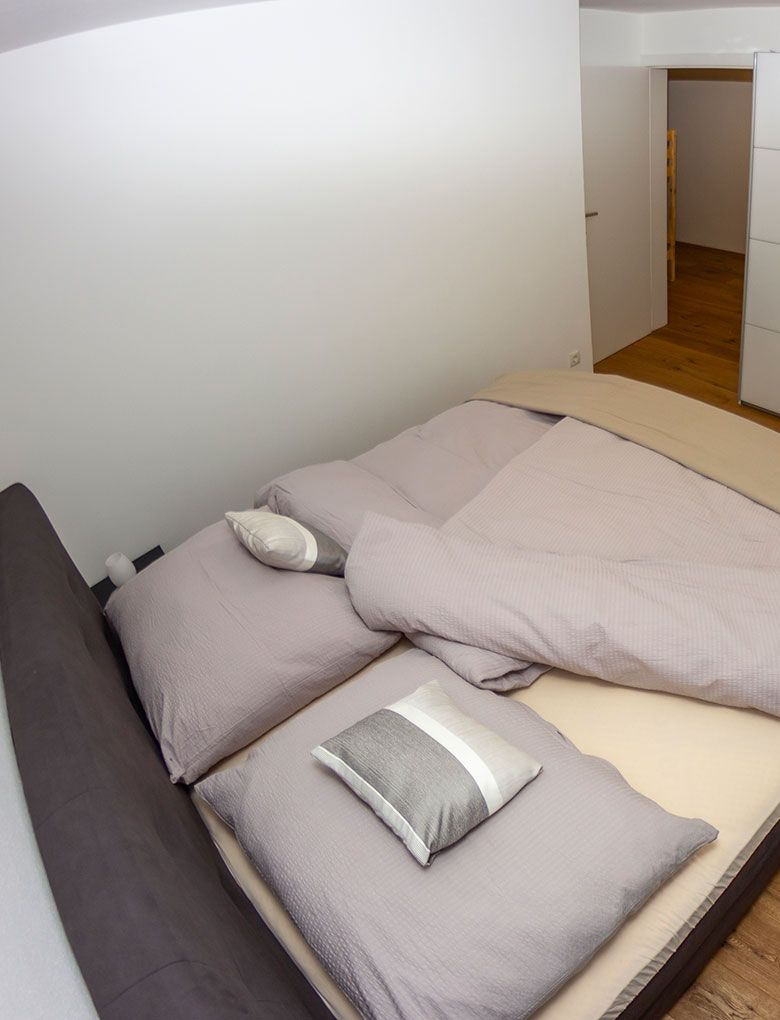 Schlafzimmeraufnahme Bett